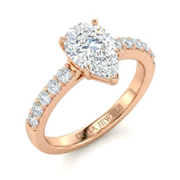 Rose Gold Pear Diamond Engagement Ring With Pavé Band Design