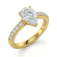 Yellow Gold Pear Diamond Engagement Ring With Pavé Band Design