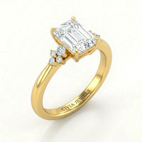 Yellow Gold Emerald Diamond Engagement Ring With Floral Cluster Side Design