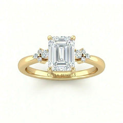 Yellow Gold Emerald Diamond Engagement Ring With Floral Cluster Side Design
