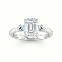 Silver Emerald Diamond Engagement Ring With Floral Cluster Side Design