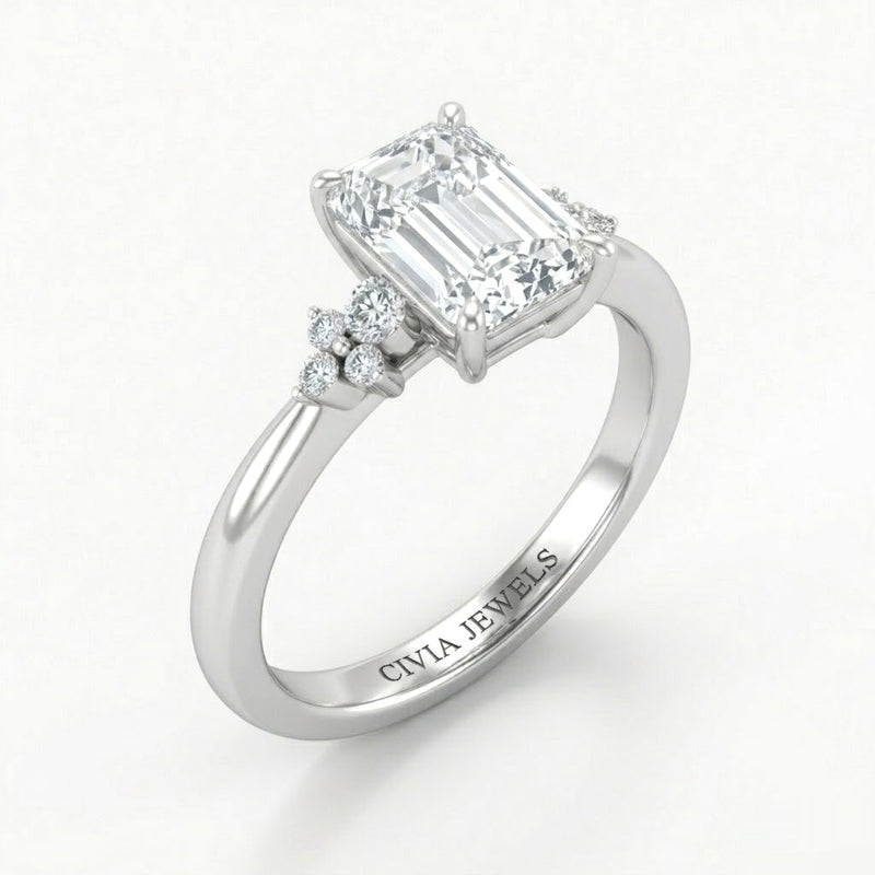 White Gold Emerald Diamond Engagement Ring With Floral Cluster Side Design