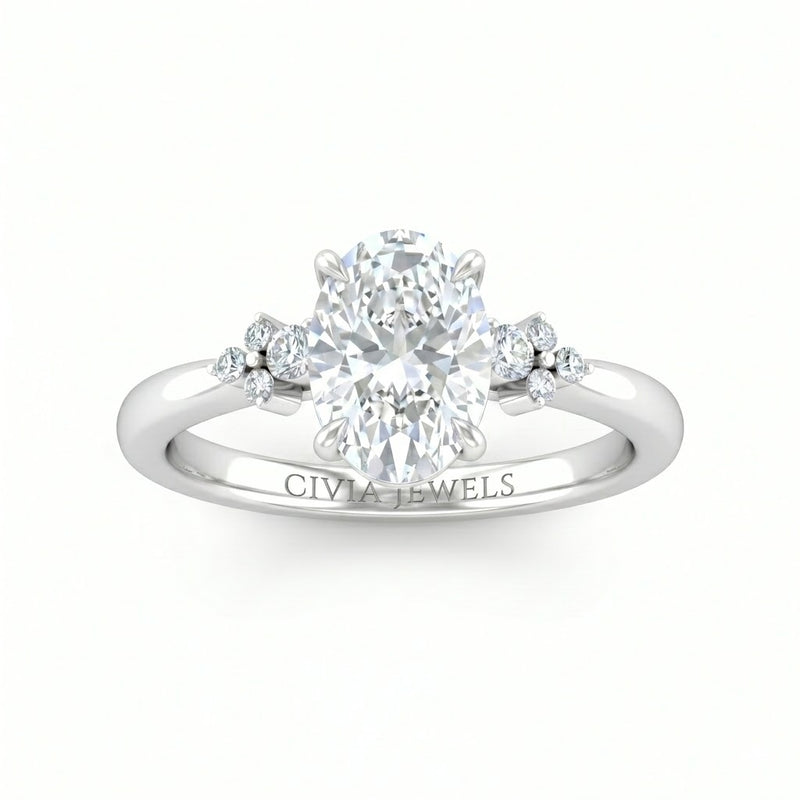 White Gold Oval Diamond Engagement Ring With Floral Cluster Side Design