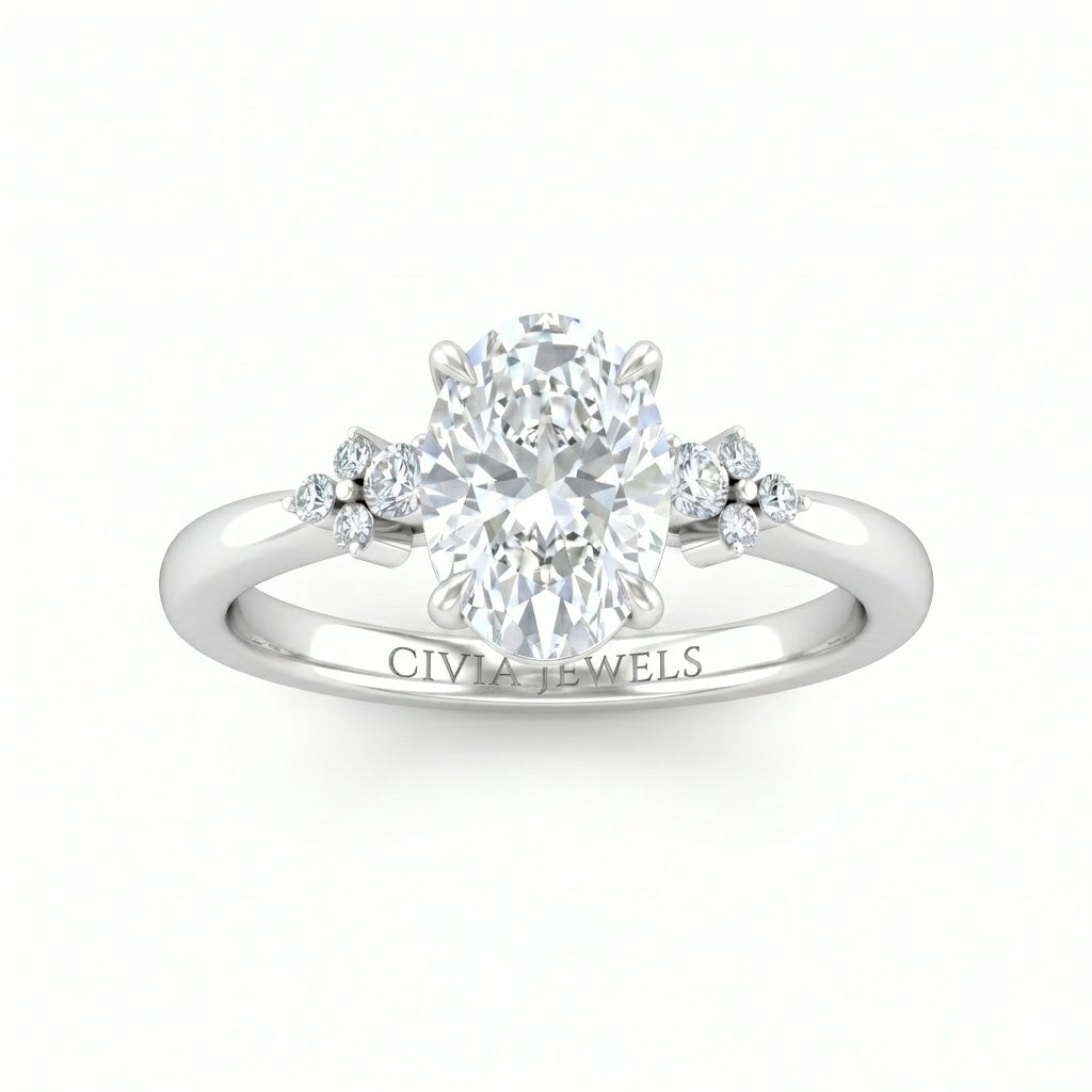 White Gold Oval Diamond Engagement Ring With Floral Cluster Side Design