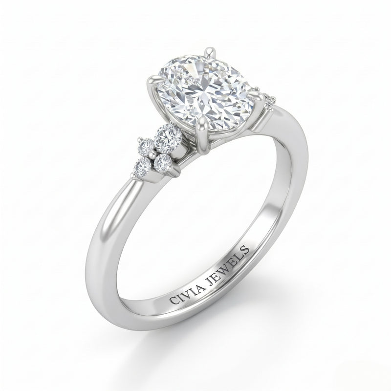 White Gold Oval Diamond Engagement Ring With Floral Cluster Side Design
