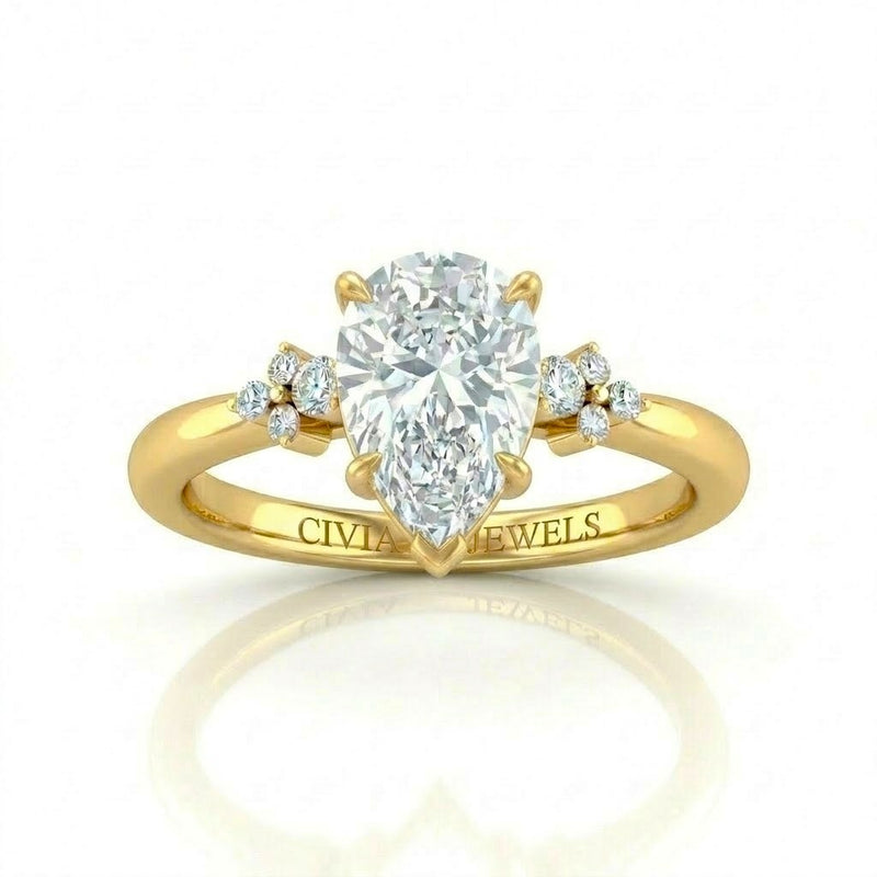 Yellow Gold Pear Diamond Engagement Ring With Floral Cluster Side Design