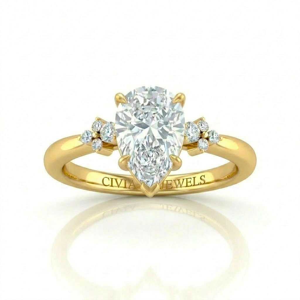 Yellow Gold Pear Diamond Engagement Ring With Floral Cluster Side Design