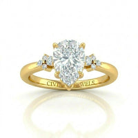 Yellow Gold Pear Diamond Engagement Ring With Floral Cluster Side Design