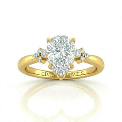Yellow Gold Pear Diamond Engagement Ring With Floral Cluster Side Design