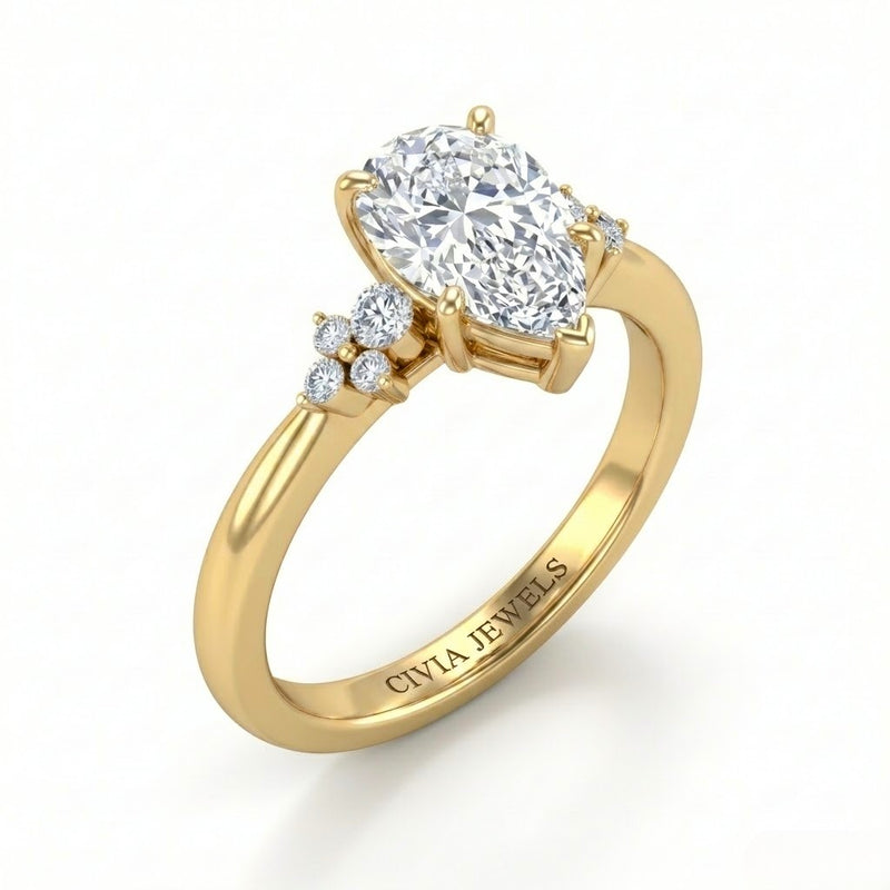 Yellow Gold Pear Diamond Engagement Ring With Floral Cluster Side Design