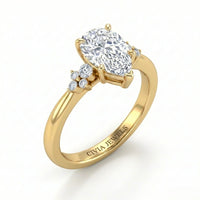 Yellow Gold Pear Diamond Engagement Ring With Floral Cluster Side Design