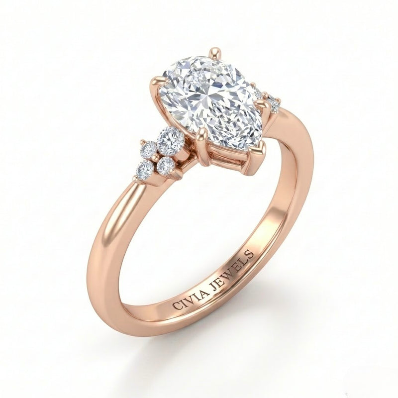 Rose Gold Pear Diamond Engagement Ring With Floral Cluster Side Design