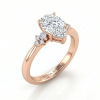 Rose Gold Pear Diamond Engagement Ring With Floral Cluster Side Design