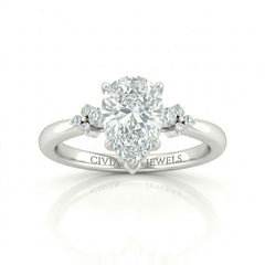 White Gold Pear Diamond Engagement Ring With Floral Cluster Side Design