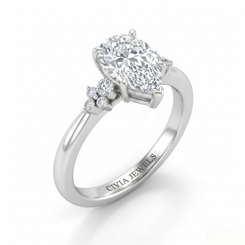 Silver Pear Diamond Engagement Ring With Floral Cluster Side Design