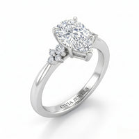 Silver Pear Diamond Engagement Ring With Floral Cluster Side Design