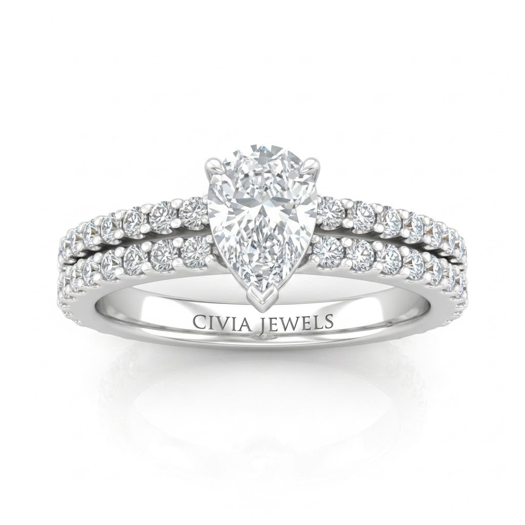 White Gold Pear Diamond Engagement Ring With Split Pavé Band Design