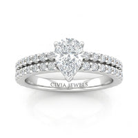 White Gold Pear Diamond Engagement Ring With Split Pavé Band Design