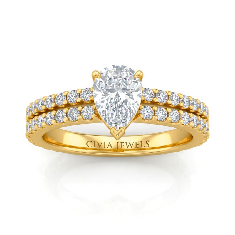 Yellow Gold Pear Diamond Engagement Ring With Split Pavé Band Design