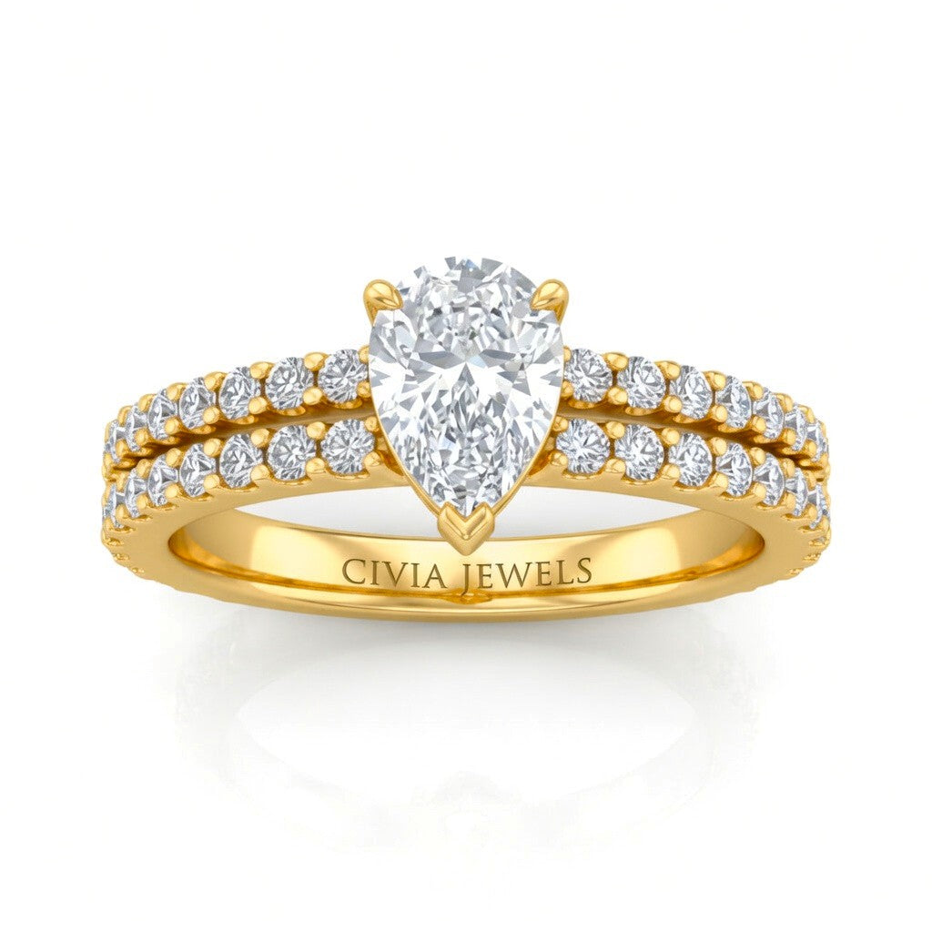Yellow Gold Pear Diamond Engagement Ring With Split Pavé Band Design