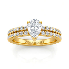 Yellow Gold Pear Diamond Engagement Ring With Split Pavé Band Design