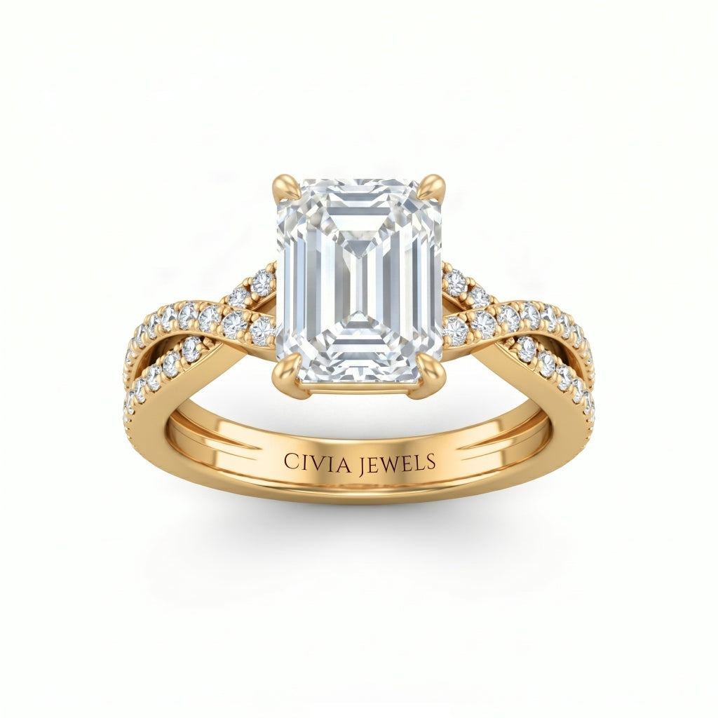 Yellow Gold Emerald Diamond Engagement Ring With Twisted Pavé Band And Four Prong Solitaire Setting