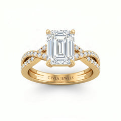 Yellow Gold Emerald Diamond Engagement Ring With Twisted Pavé Band And Four Prong Solitaire Setting