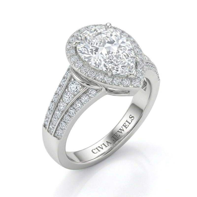 White Gold Pear Diamond Halo Engagement Ring With Triple Split Pave Shank