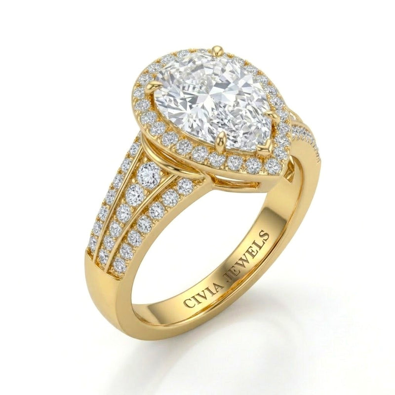 Yellow Gold Pear Diamond Halo Engagement Ring With Triple Split Pave Shank