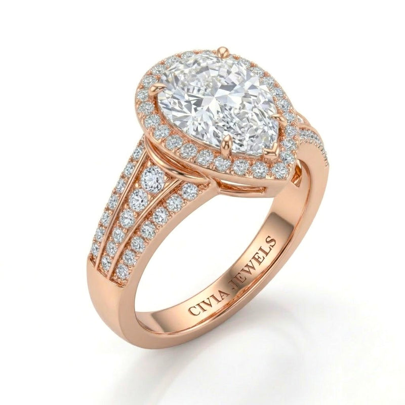 Rose Gold Pear Diamond Halo Engagement Ring With Triple Split Pave Shank