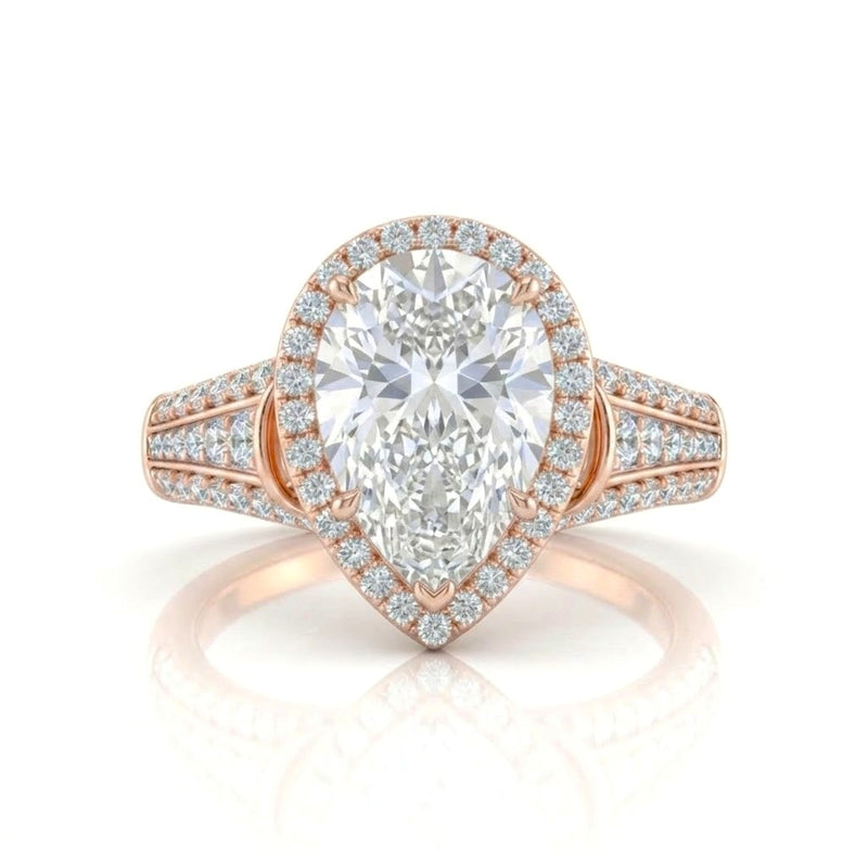 Rose Gold Pear Diamond Halo Engagement Ring With Triple Split Pave Shank