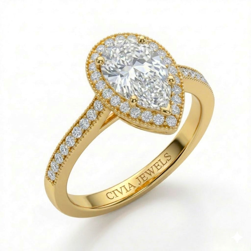 Yellow Gold Pear Diamond Halo Engagement Ring With Pave Band