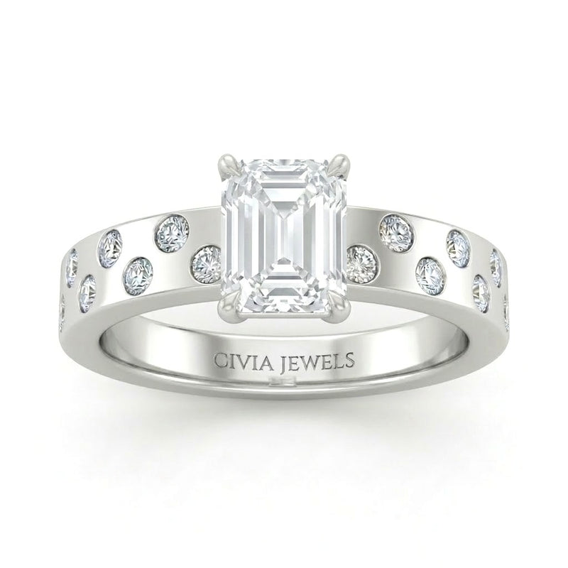 White Gold Emerald Diamond Scattered Engagement Ring With Flush Set Accent Band