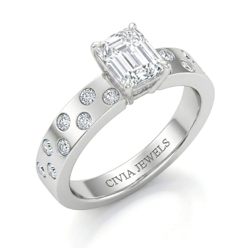 White Gold Emerald Diamond Scattered Engagement Ring With Flush Set Accent Band