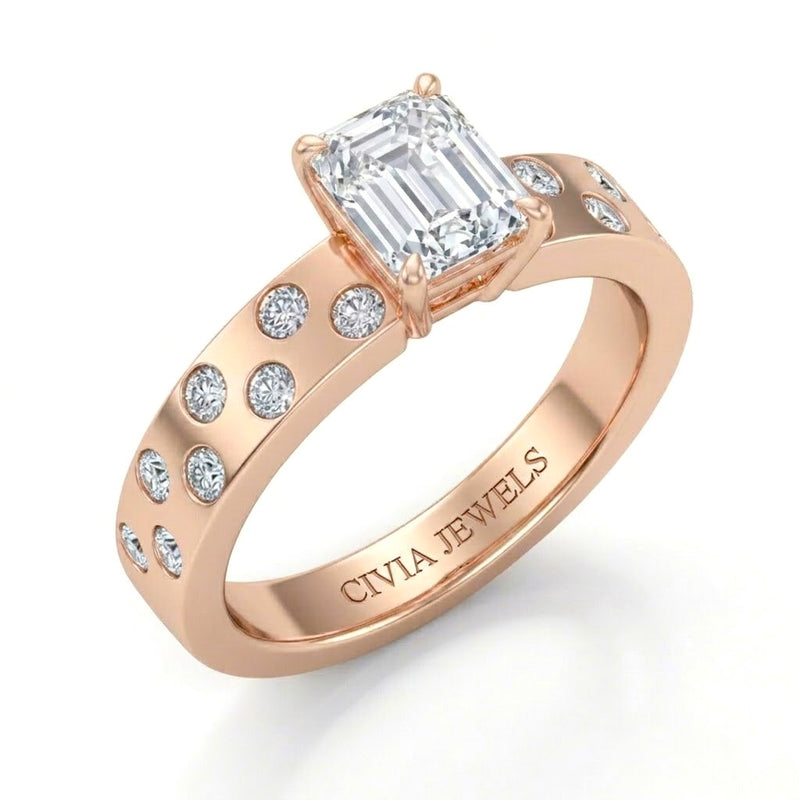 Rose Gold Emerald Diamond Scattered Engagement Ring With Flush Set Accent Band