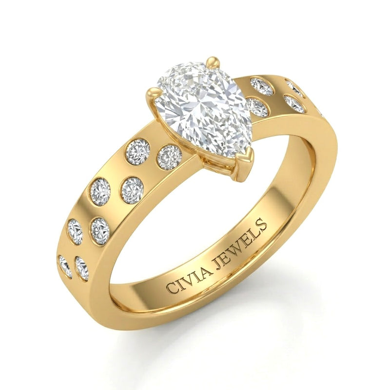 Yellow Gold Pear Diamond Scattered Engagement Ring With Flush Set Accent Band