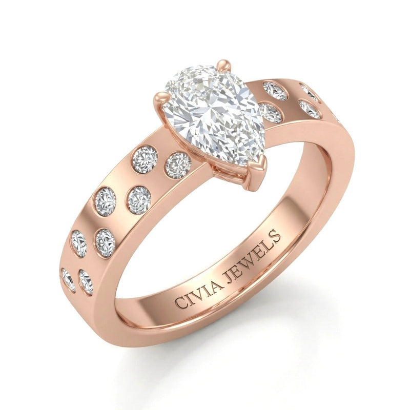 Rose Gold Pear Diamond Scattered Engagement Ring With Flush Set Accent Band