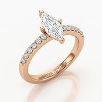Rose Gold Marquise Diamond Solitaire Engagement Ring With Graduated Pave Band
