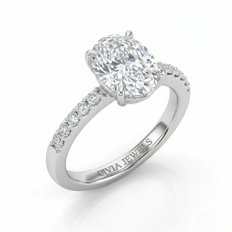 Silver Oval Diamond Solitaire Engagement Ring With Graduated Pave Band