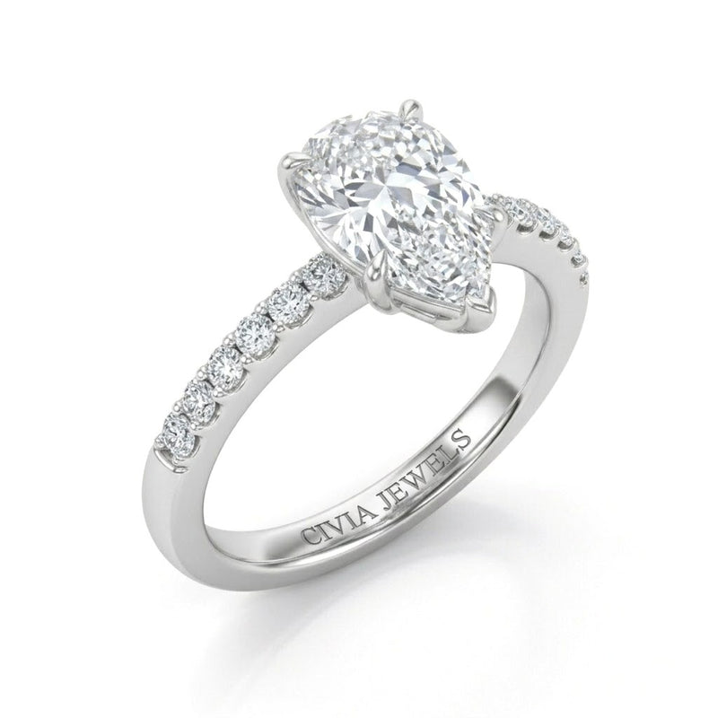 White Gold Pear Diamond Solitaire Engagement Ring With Classic Pave Band