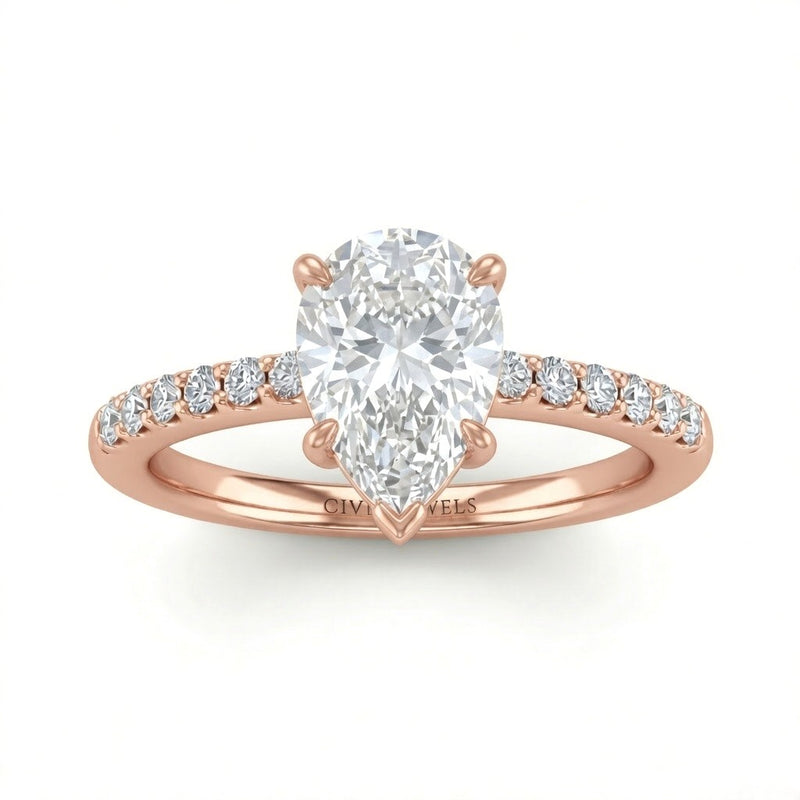Rose Gold Pear Diamond Solitaire Engagement Ring With Graduated Pave Band