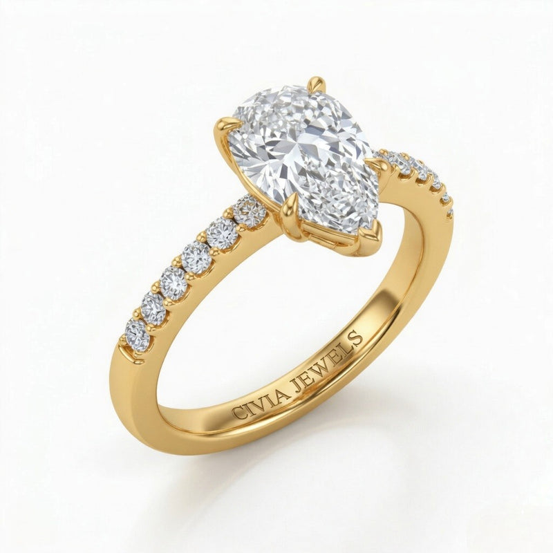 Yellow Gold Pear Diamond Solitaire Engagement Ring With Classic Pave Band