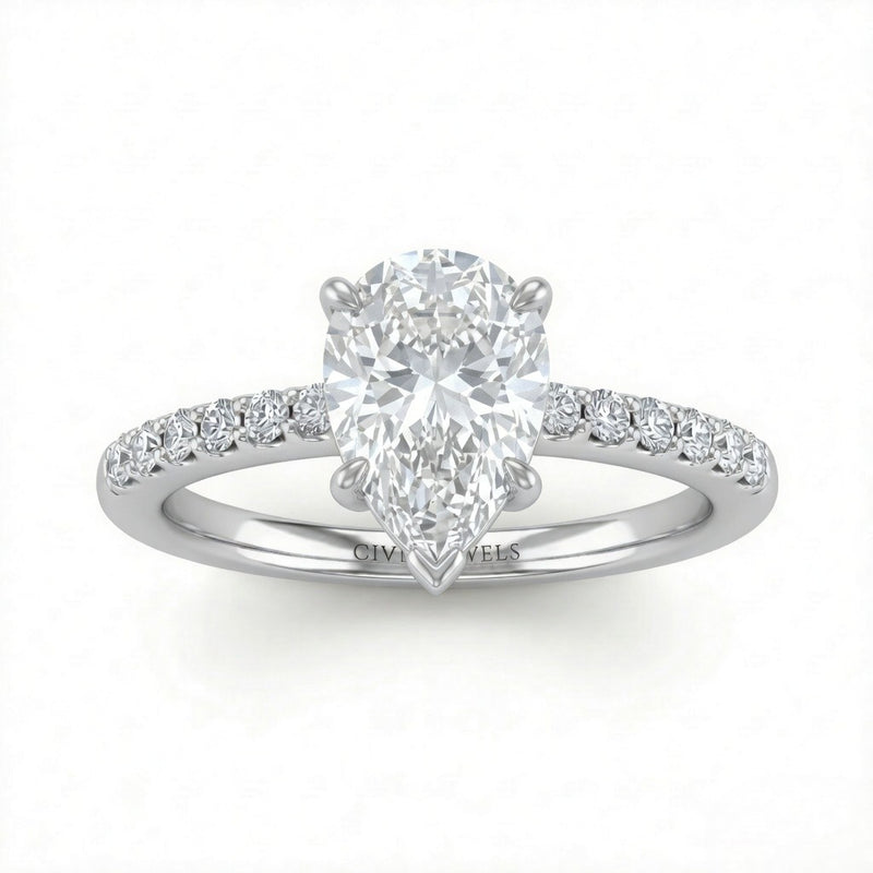 White Gold Pear Diamond Solitaire Engagement Ring With Graduated Pave Band