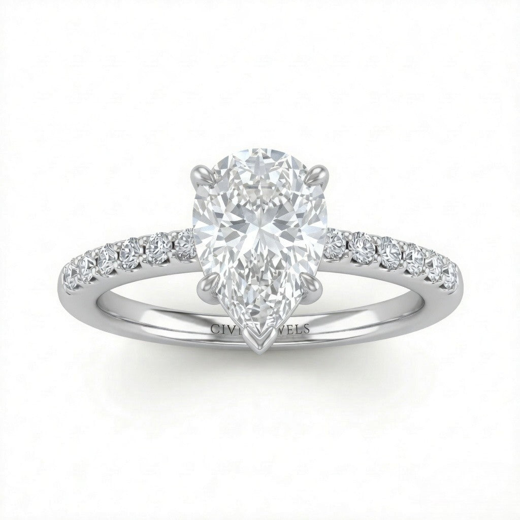 Silver Pear Diamond Solitaire Engagement Ring With Graduated Pave Band