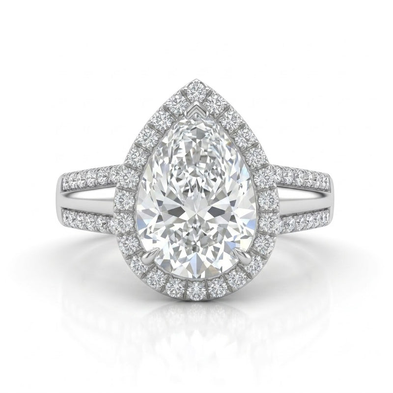 White Gold Pear Cut Diamond Halo Engagement Ring With Split Pave Shank