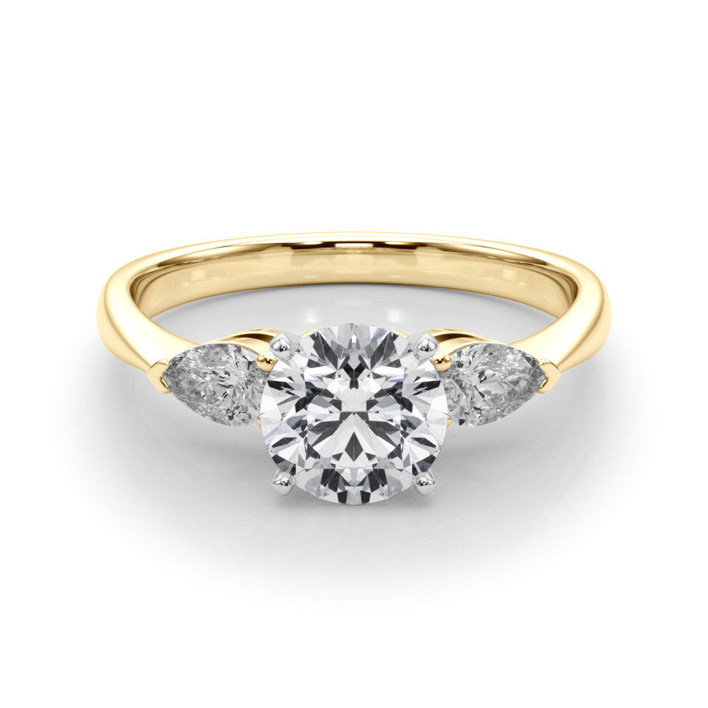 Yellow gold Three-Stone Heart Diamond Ring with Pear Side Stones on a Platinum Band with Four-Prong Setting