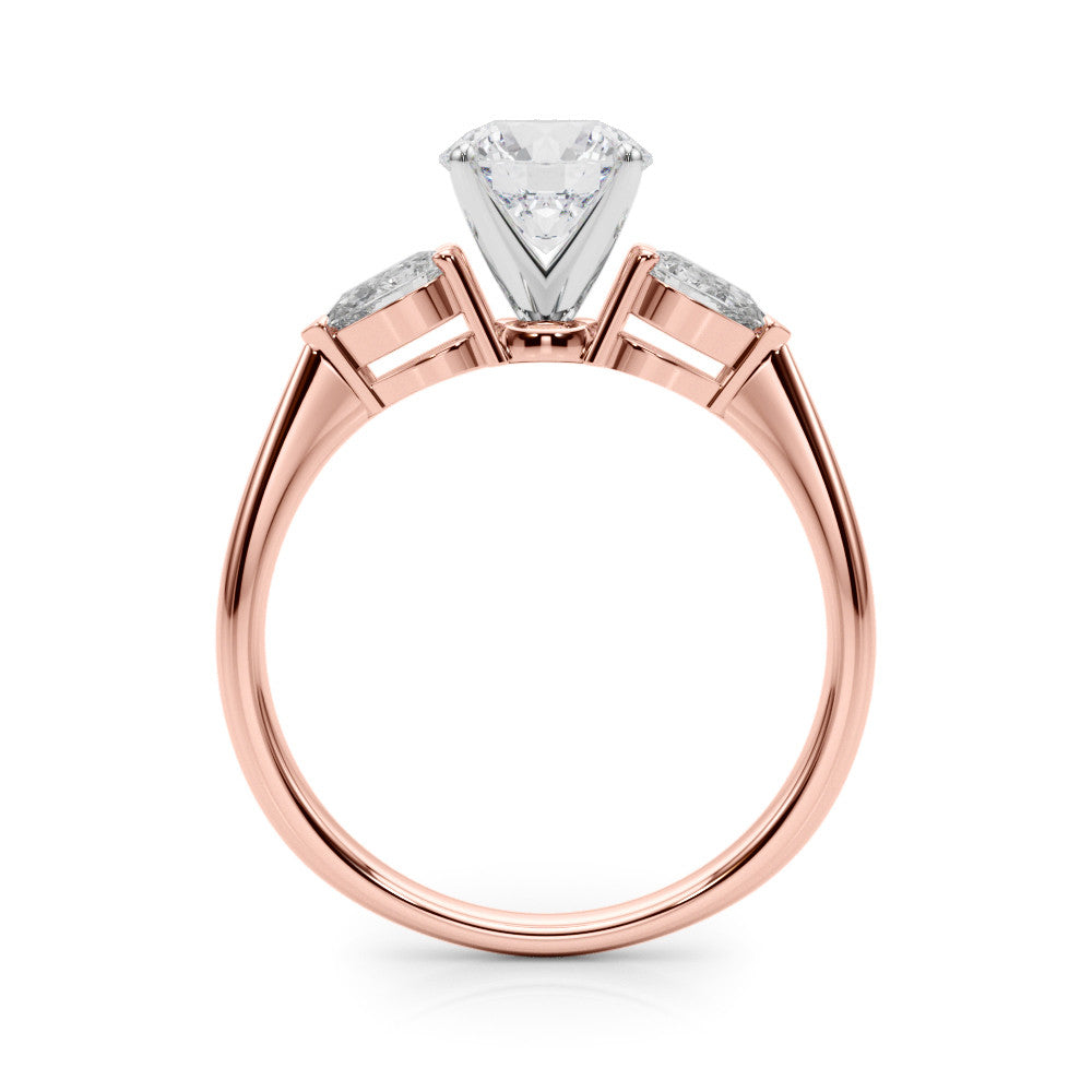 Rose gold Three-Stone Heart Diamond Ring with Pear Side Stones on a Platinum Band with Four-Prong Setting