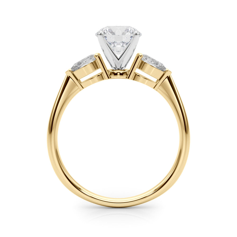 Yellow gold Three-Stone Heart Diamond Ring with Pear Side Stones on a Platinum Band with Four-Prong Setting
