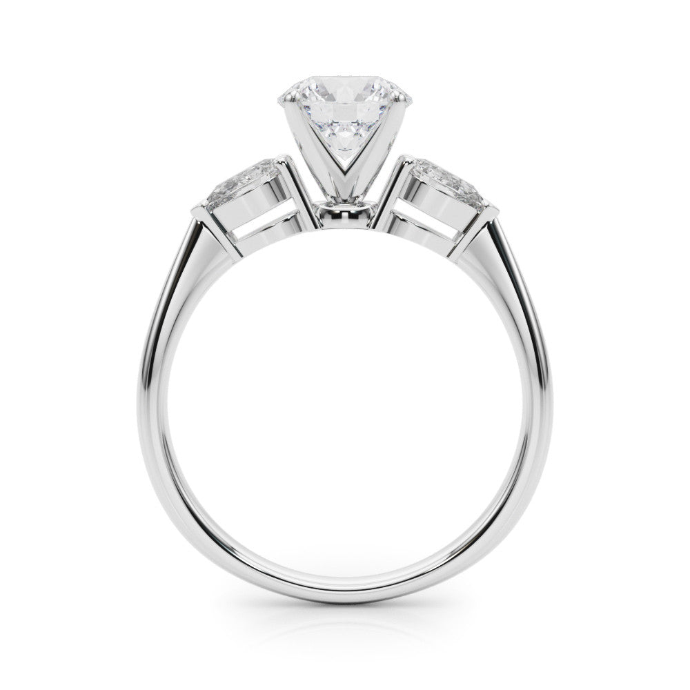White gold Three-Stone Heart Diamond Ring with Pear Side Stones on a Platinum Band with Four-Prong Setting