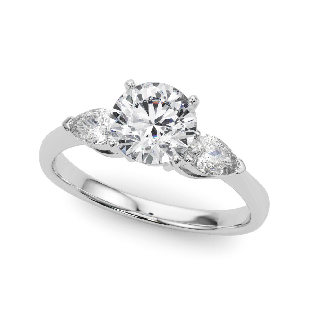 White gold Three-Stone Heart Diamond Ring with Pear Side Stones on a Platinum Band with Four-Prong Setting